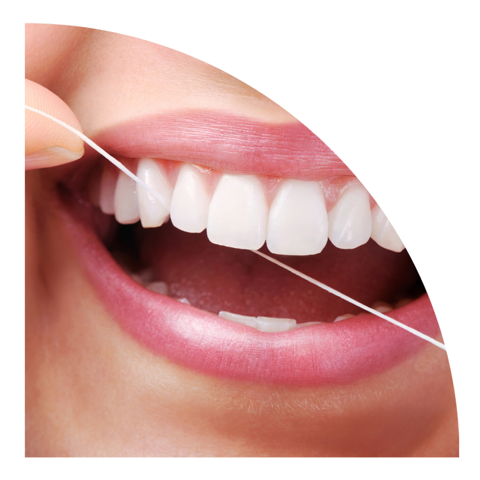 A bright smile, showing their clean, white teeth.